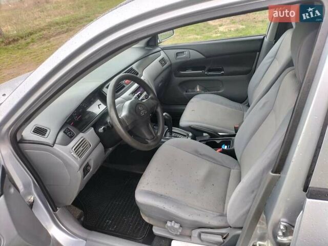 Сірий Міцубісі Lancer, об'ємом двигуна 1.6 л та пробігом 174 тис. км за 4100 $, фото 7 на Automoto.ua