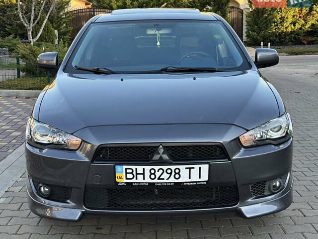 Сірий Міцубісі Lancer, об'ємом двигуна 2 л та пробігом 92 тис. км за 9800 $, фото 37 на Automoto.ua