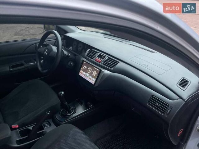 Сірий Міцубісі Lancer, об'ємом двигуна 1.6 л та пробігом 254 тис. км за 3800 $, фото 17 на Automoto.ua