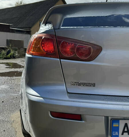 Серый Мицубиси Лансер, объемом двигателя 2 л и пробегом 190 тыс. км за 6900 $, фото 23 на Automoto.ua