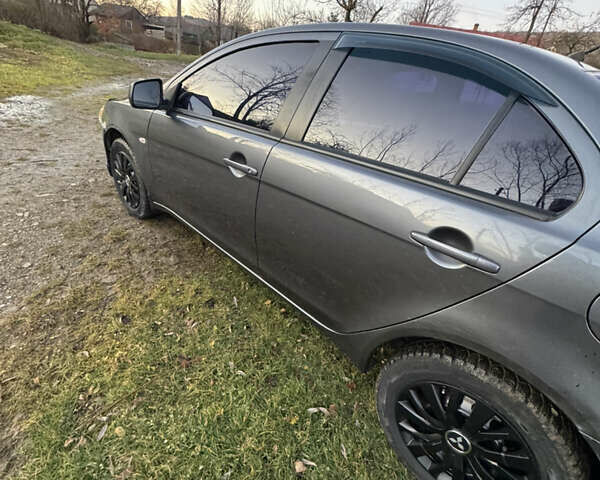 Сірий Міцубісі Lancer, об'ємом двигуна 1.5 л та пробігом 239 тис. км за 4900 $, фото 5 на Automoto.ua