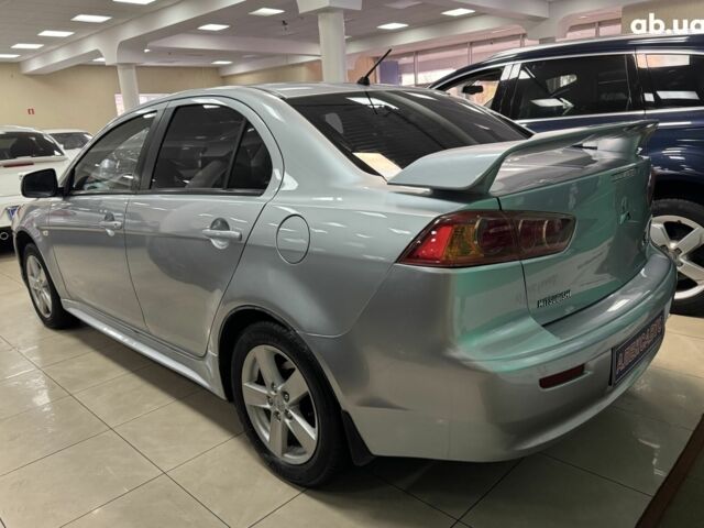 Серый Мицубиси Лансер, объемом двигателя 0 л и пробегом 241 тыс. км за 6400 $, фото 1 на Automoto.ua