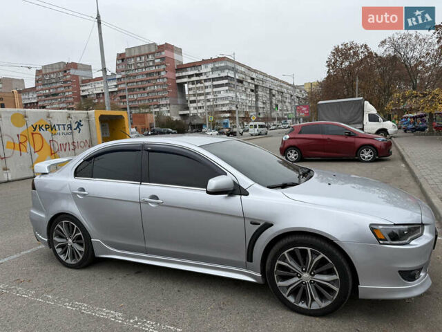 Сірий Міцубісі Lancer, об'ємом двигуна 2 л та пробігом 253 тис. км за 8700 $, фото 11 на Automoto.ua