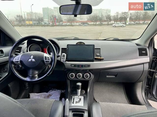 Серый Мицубиси Лансер, объемом двигателя 2 л и пробегом 203 тыс. км за 4999 $, фото 8 на Automoto.ua