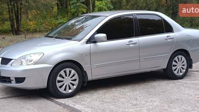 Сірий Міцубісі Lancer, об'ємом двигуна 1.6 л та пробігом 176 тис. км за 4999 $, фото 2 на Automoto.ua