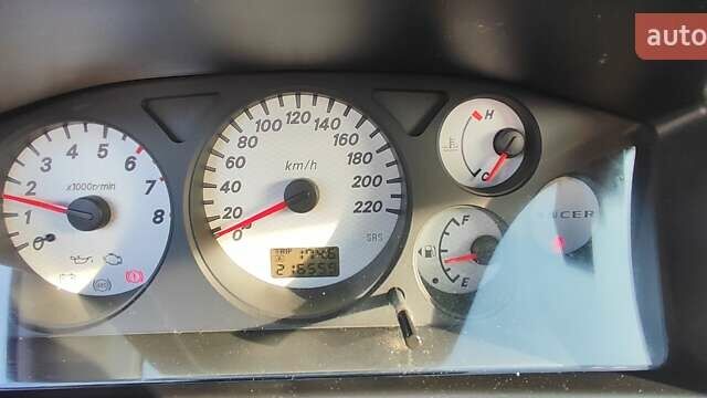 Серый Мицубиси Лансер, объемом двигателя 1.58 л и пробегом 216 тыс. км за 4700 $, фото 4 на Automoto.ua