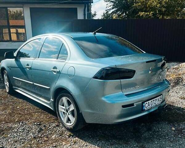 Сірий Міцубісі Lancer, об'ємом двигуна 2 л та пробігом 212 тис. км за 7300 $, фото 9 на Automoto.ua