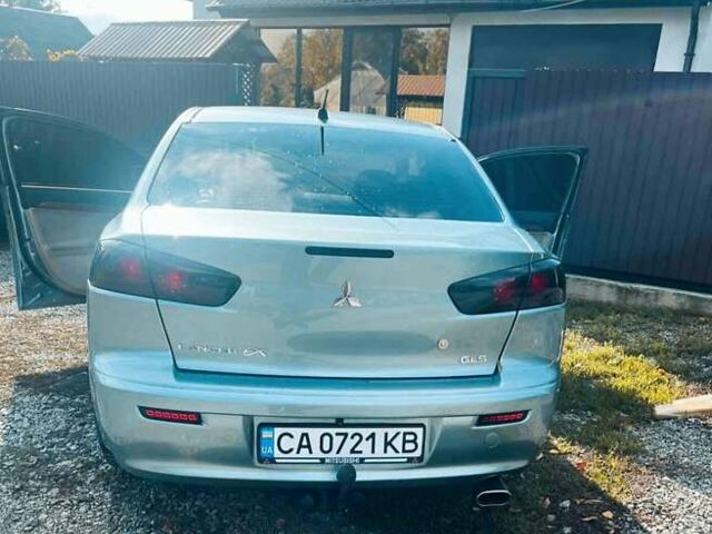 Сірий Міцубісі Lancer, об'ємом двигуна 2 л та пробігом 212 тис. км за 7300 $, фото 1 на Automoto.ua