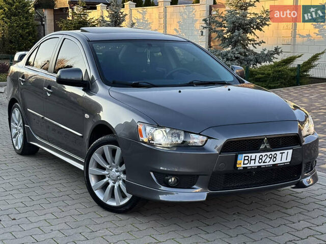 Сірий Міцубісі Lancer, об'ємом двигуна 2 л та пробігом 92 тис. км за 9800 $, фото 48 на Automoto.ua