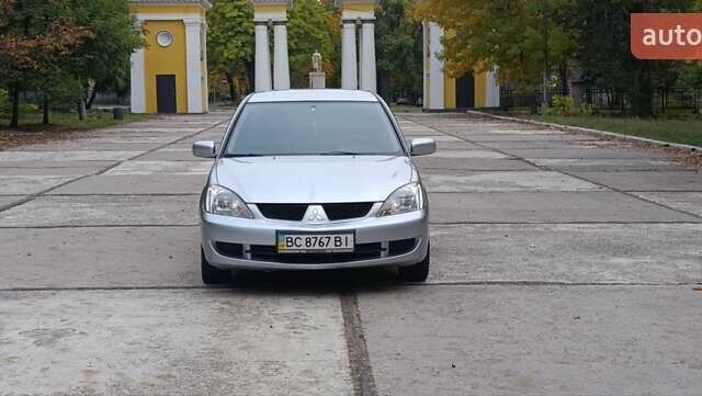 Сірий Міцубісі Lancer, об'ємом двигуна 1.6 л та пробігом 176 тис. км за 4999 $, фото 16 на Automoto.ua