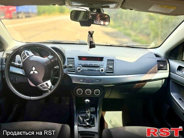 Серый Мицубиси Лансер, объемом двигателя 2 л и пробегом 250 тыс. км за 5800 $, фото 4 на Automoto.ua