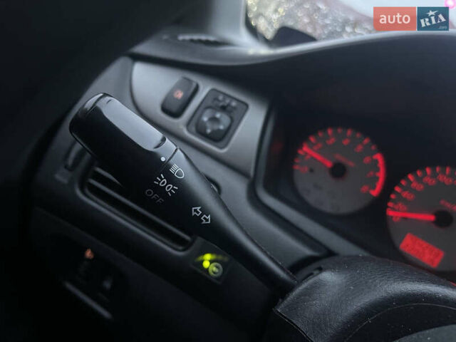 Сірий Міцубісі Lancer, об'ємом двигуна 1.58 л та пробігом 220 тис. км за 5900 $, фото 9 на Automoto.ua