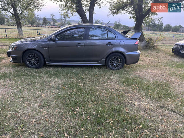 Серый Мицубиси Лансер, объемом двигателя 1.5 л и пробегом 255 тыс. км за 6000 $, фото 8 на Automoto.ua