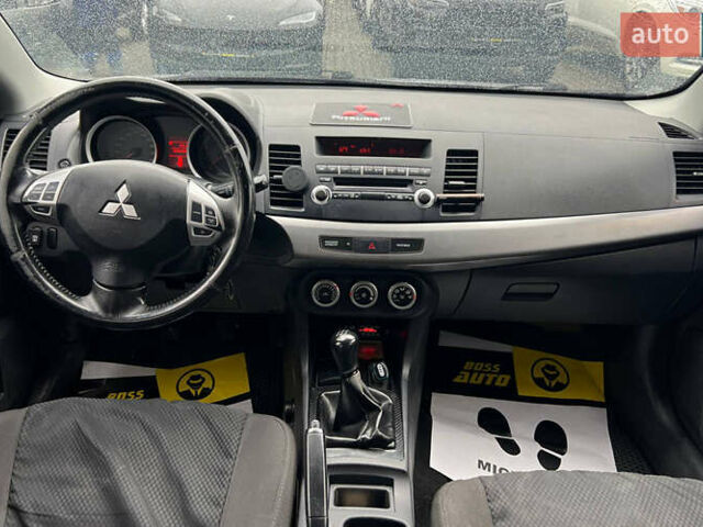Серый Мицубиси Лансер, объемом двигателя 1.5 л и пробегом 239 тыс. км за 6000 $, фото 5 на Automoto.ua