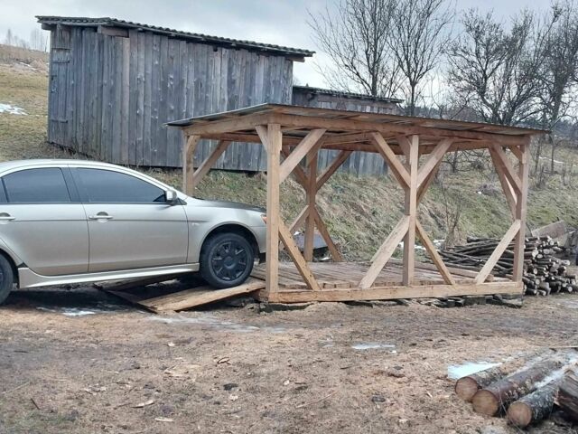 Серый Мицубиси Лансер, объемом двигателя 1.5 л и пробегом 166 тыс. км за 5500 $, фото 1 на Automoto.ua