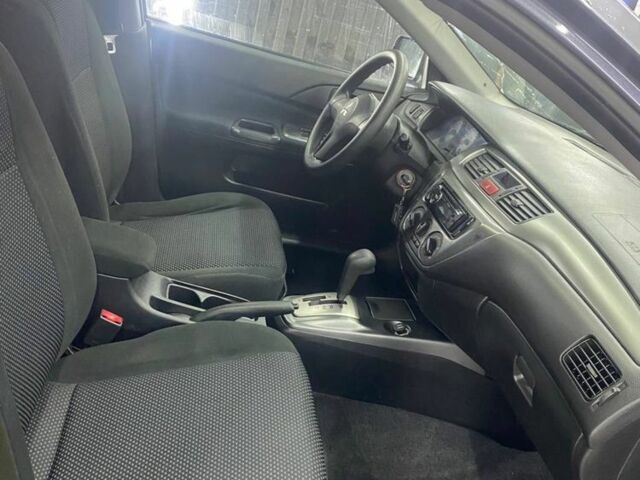 Серый Мицубиси Лансер, объемом двигателя 1.6 л и пробегом 100 тыс. км за 2500 $, фото 4 на Automoto.ua