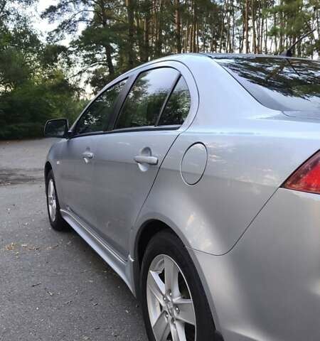 Міцубісі Lancer 2008 у Києві на Automoto.ua Сірий Міцубісі Lancer, об'ємом двигуна 2 л та пробігом 175 тис. км за 8200 $, фото 10 на Automoto.ua