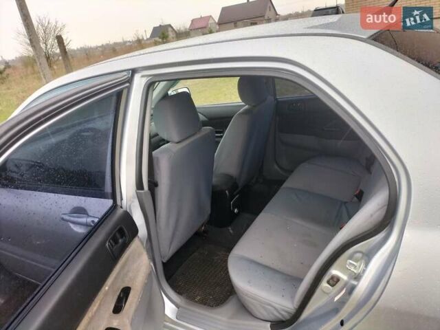 Сірий Міцубісі Lancer, об'ємом двигуна 1.6 л та пробігом 174 тис. км за 4100 $, фото 6 на Automoto.ua