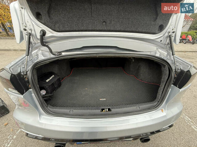 Сірий Міцубісі Lancer, об'ємом двигуна 2 л та пробігом 253 тис. км за 8700 $, фото 20 на Automoto.ua