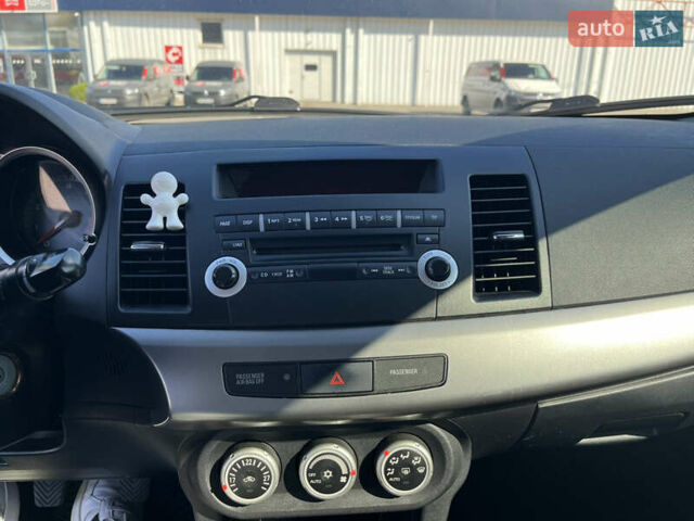 Сірий Міцубісі Lancer, об'ємом двигуна 2 л та пробігом 237 тис. км за 7200 $, фото 31 на Automoto.ua