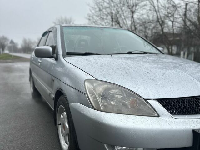 Сірий Міцубісі Lancer, об'ємом двигуна 1.6 л та пробігом 222 тис. км за 4300 $, фото 1 на Automoto.ua