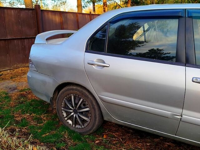 Сірий Міцубісі Lancer, об'ємом двигуна 1.6 л та пробігом 250 тис. км за 3500 $, фото 2 на Automoto.ua