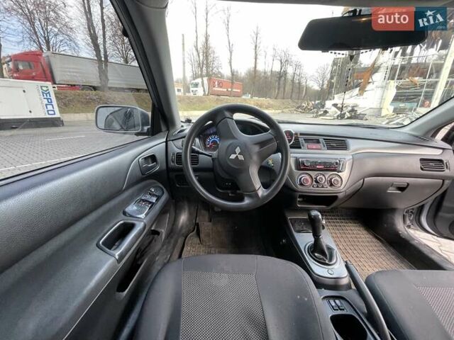 Сірий Міцубісі Lancer, об'ємом двигуна 1.6 л та пробігом 260 тис. км за 4200 $, фото 6 на Automoto.ua
