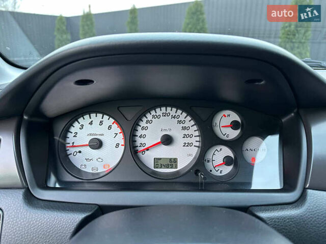 Серый Мицубиси Лансер, объемом двигателя 1.58 л и пробегом 34 тыс. км за 7500 $, фото 47 на Automoto.ua