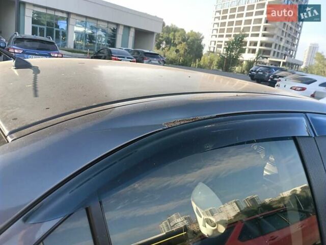 Сірий Міцубісі Lancer, об'ємом двигуна 2 л та пробігом 300 тис. км за 5500 $, фото 13 на Automoto.ua