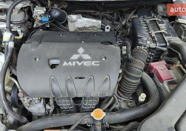 Міцубісі Lancer 2008 у Києві на Automoto.ua Сірий Міцубісі Lancer, об'ємом двигуна 2 л та пробігом 175 тис. км за 8200 $, фото 13 на Automoto.ua