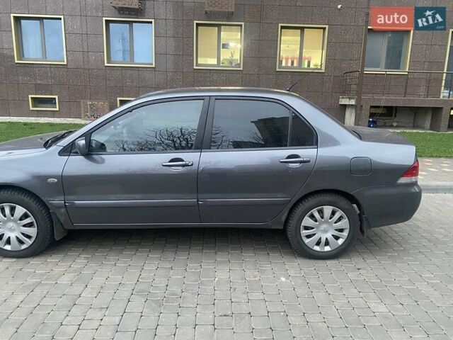 Сірий Міцубісі Lancer, об'ємом двигуна 1.6 л та пробігом 250 тис. км за 3500 $, фото 2 на Automoto.ua