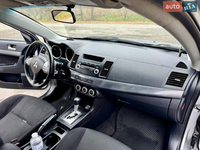 Сірий Міцубісі Lancer, об'ємом двигуна 2 л та пробігом 225 тис. км за 6890 $, фото 16 на Automoto.ua