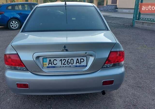 Серый Мицубиси Лансер, объемом двигателя 1.6 л и пробегом 117 тыс. км за 3980 $, фото 6 на Automoto.ua