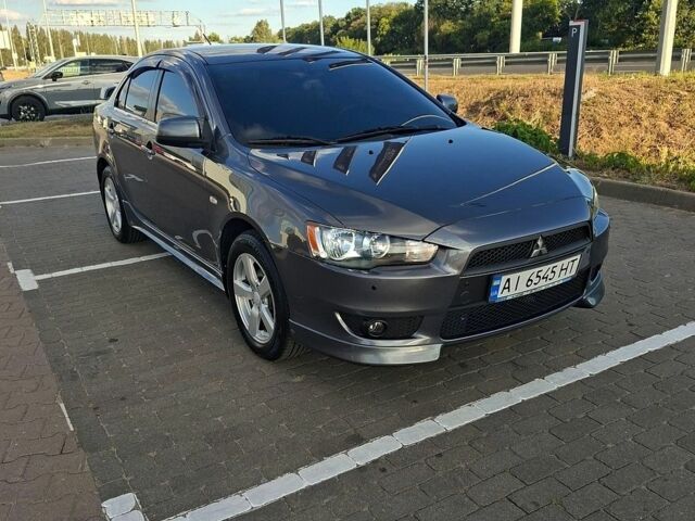 Сірий Міцубісі Lancer, об'ємом двигуна 2 л та пробігом 158 тис. км за 8300 $, фото 24 на Automoto.ua
