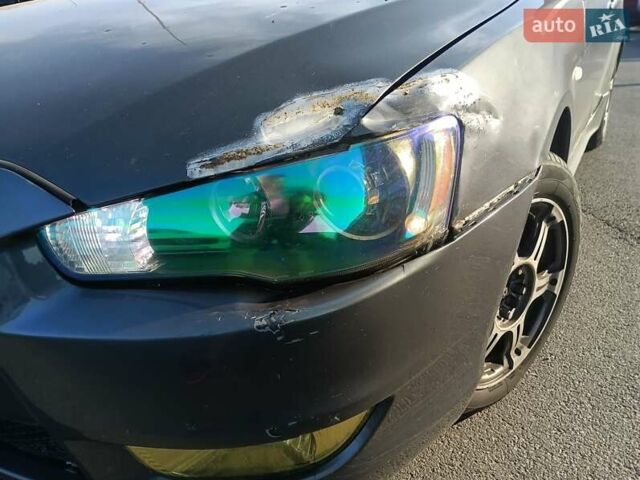 Сірий Міцубісі Lancer, об'ємом двигуна 2 л та пробігом 300 тис. км за 5500 $, фото 12 на Automoto.ua