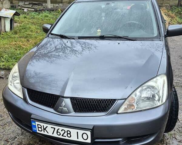 Сірий Міцубісі Lancer, об'ємом двигуна 1.6 л та пробігом 230 тис. км за 4400 $, фото 2 на Automoto.ua