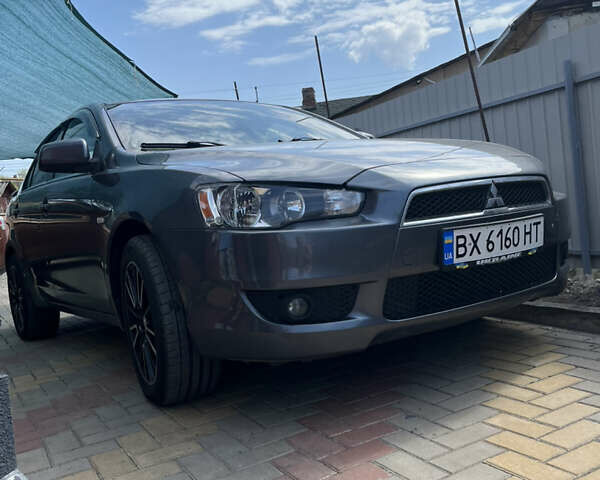 Сірий Міцубісі Lancer, об'ємом двигуна 1.8 л та пробігом 207 тис. км за 5800 $, фото 1 на Automoto.ua