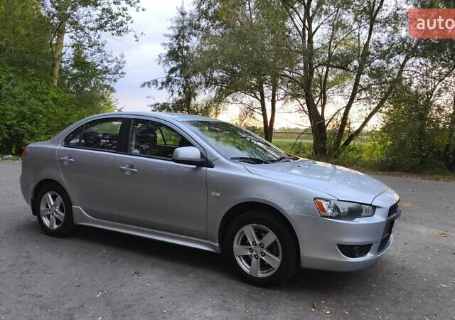 Міцубісі Lancer 2008 у Києві на Automoto.ua Сірий Міцубісі Lancer, об'ємом двигуна 2 л та пробігом 175 тис. км за 8200 $, фото 9 на Automoto.ua