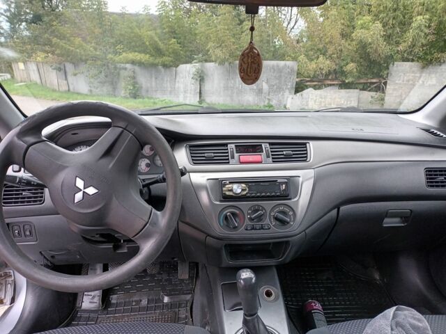 Сірий Міцубісі Lancer, об'ємом двигуна 1.6 л та пробігом 224 тис. км за 3100 $, фото 6 на Automoto.ua