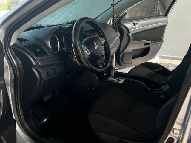 Сірий Міцубісі Lancer, об'ємом двигуна 2 л та пробігом 238 тис. км за 6400 $, фото 13 на Automoto.ua