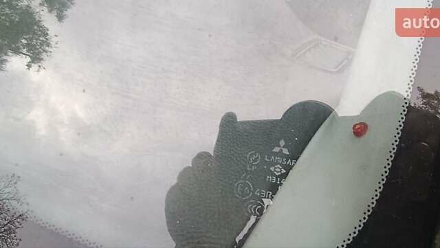 Серый Мицубиси Лансер, объемом двигателя 1.58 л и пробегом 176 тыс. км за 5000 $, фото 27 на Automoto.ua