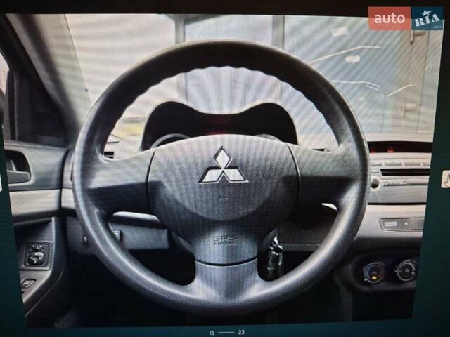 Сірий Міцубісі Lancer, об'ємом двигуна 1.5 л та пробігом 235 тис. км за 6500 $, фото 15 на Automoto.ua