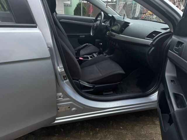 Серый Мицубиси Лансер, объемом двигателя 1.5 л и пробегом 147 тыс. км за 6700 $, фото 9 на Automoto.ua