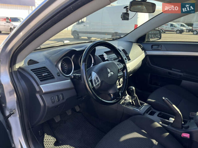 Сірий Міцубісі Lancer, об'ємом двигуна 2 л та пробігом 237 тис. км за 7200 $, фото 28 на Automoto.ua