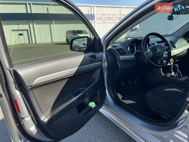 Сірий Міцубісі Lancer, об'ємом двигуна 2 л та пробігом 237 тис. км за 7200 $, фото 27 на Automoto.ua
