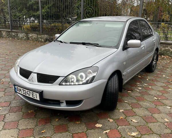 Сірий Міцубісі Lancer, об'ємом двигуна 1.59 л та пробігом 219 тис. км за 4500 $, фото 2 на Automoto.ua