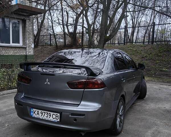 Сірий Міцубісі Lancer, об'ємом двигуна 2 л та пробігом 186 тис. км за 6000 $, фото 5 на Automoto.ua