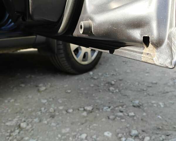 Сірий Міцубісі Lancer, об'ємом двигуна 1.58 л та пробігом 97 тис. км за 6800 $, фото 14 на Automoto.ua