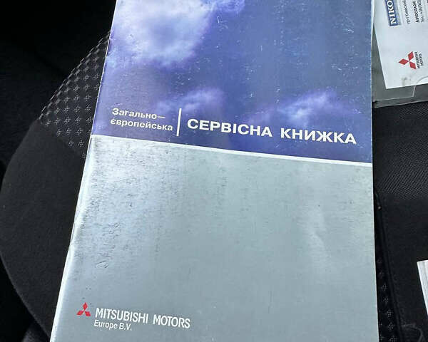 Серый Мицубиси Лансер, объемом двигателя 1.58 л и пробегом 34 тыс. км за 7500 $, фото 58 на Automoto.ua