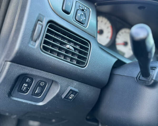Сірий Міцубісі Lancer, об'ємом двигуна 1.6 л та пробігом 278 тис. км за 3999 $, фото 7 на Automoto.ua